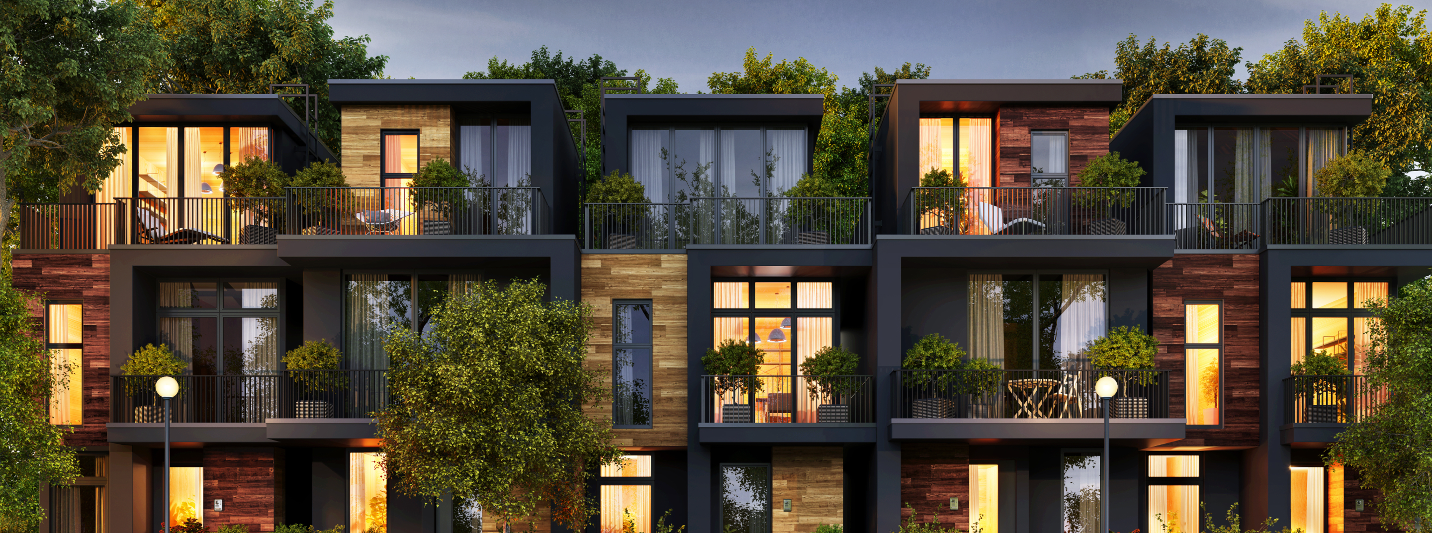 Bâtiment résidentiel moderne avec terrasses et végétation